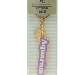 ME Essentials Gold‎ and Purple Aquarius Keychain